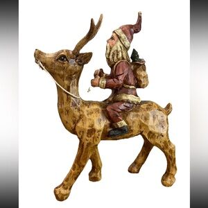 Primitive Folk Art Santa riding Reindeer 12” tall chiseled resin faux wood